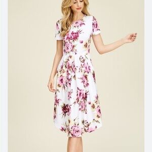 Reborn J short sleeve floral dress with pockets size medium